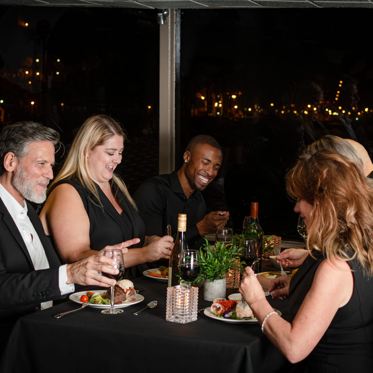 Group of friends at a dinner-cruise.
