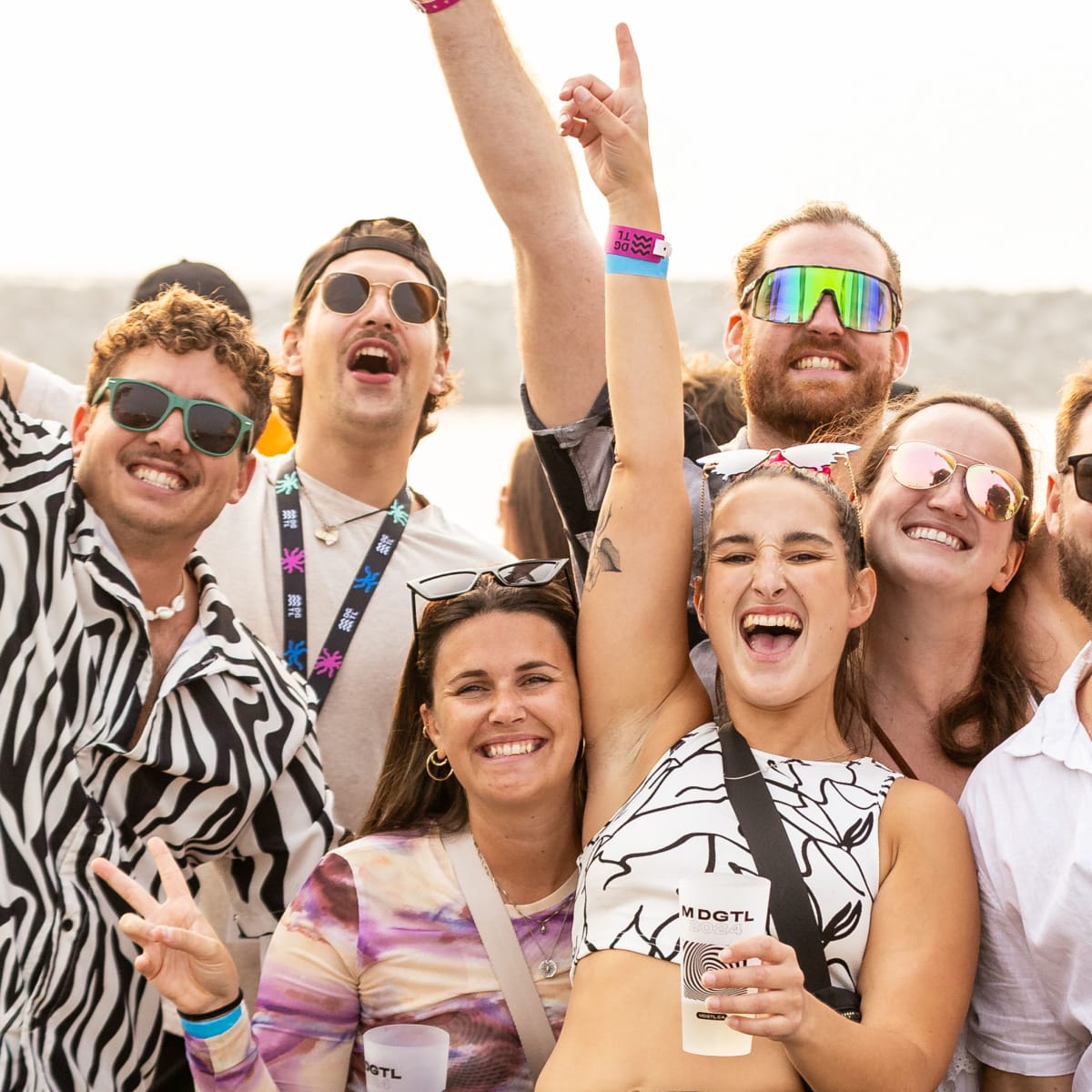M DGTL - Young adults partying at the beach