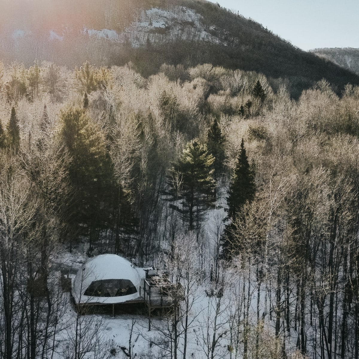Discover Outaouais and its many areas with these must-sees! - Aerial view of Dômes Outaouais in winter