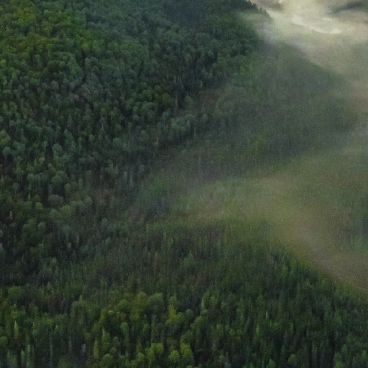 Your adventure begins in Saguenay–Lac-Saint-Jean - Mountainous landscape at sunset