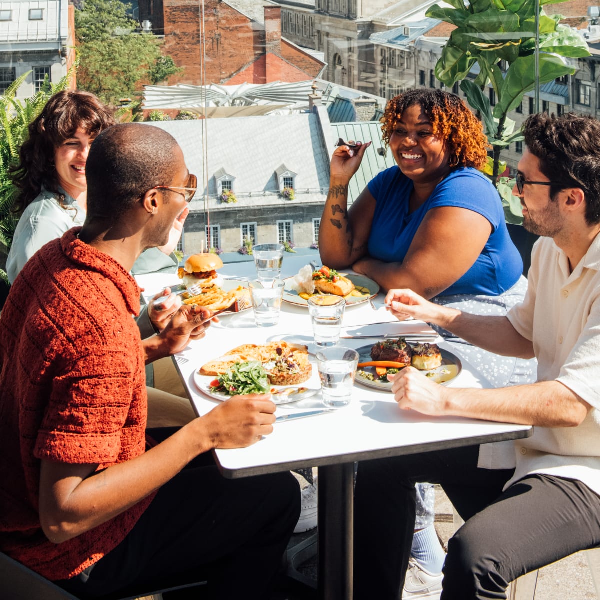 Group of friends on a rooftop terrace.