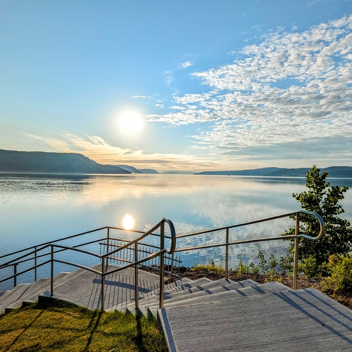 Stairs on a boardwalk along the banks of the Saguenay Fjord.