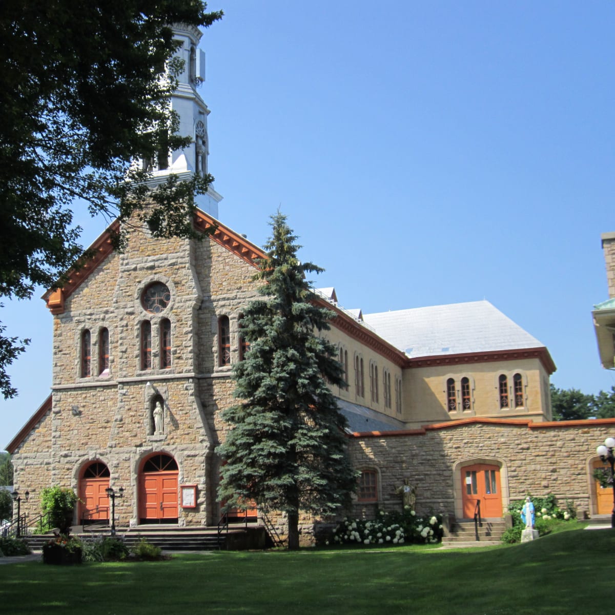The Montebello church, surrounded by greenery.