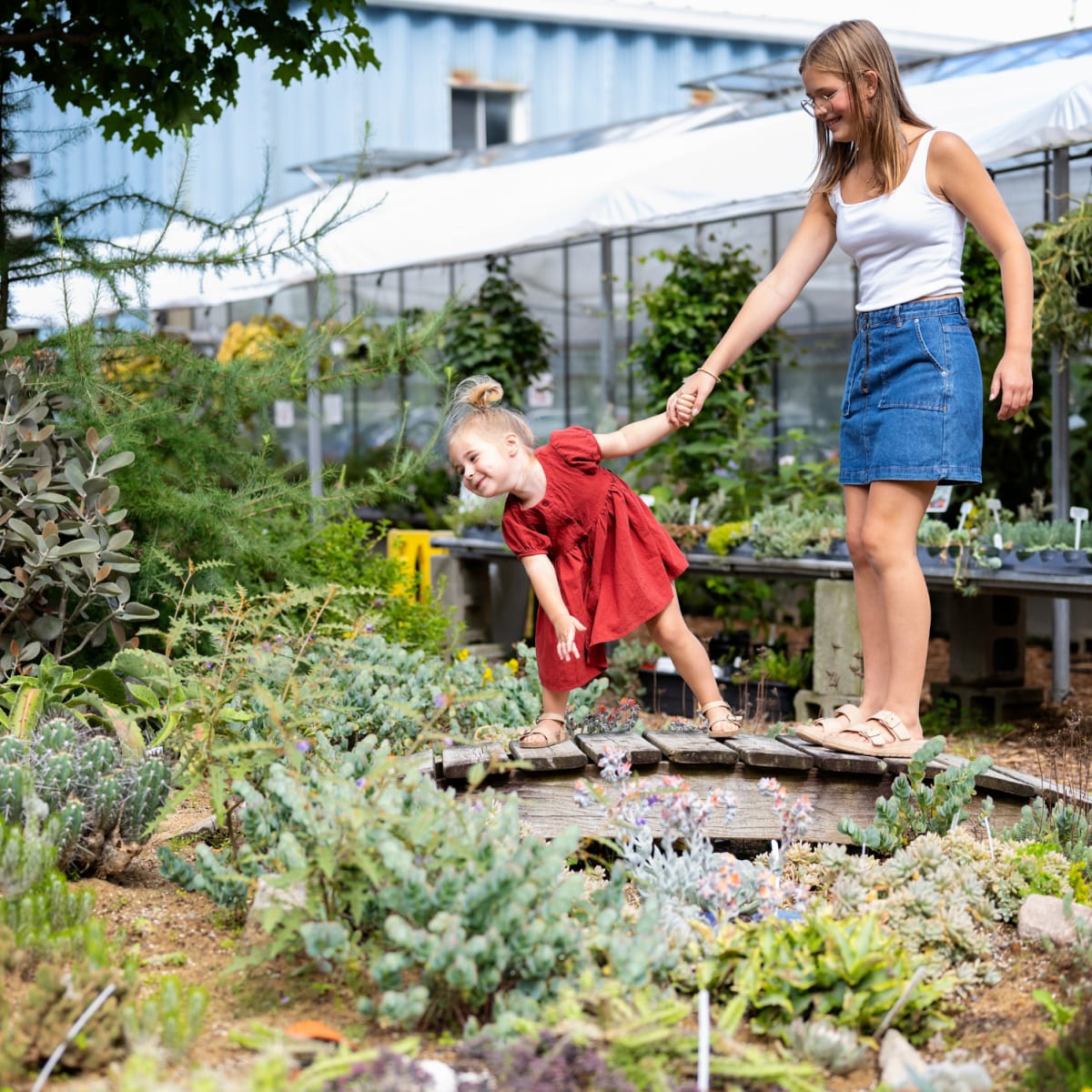 2 girls in a garden