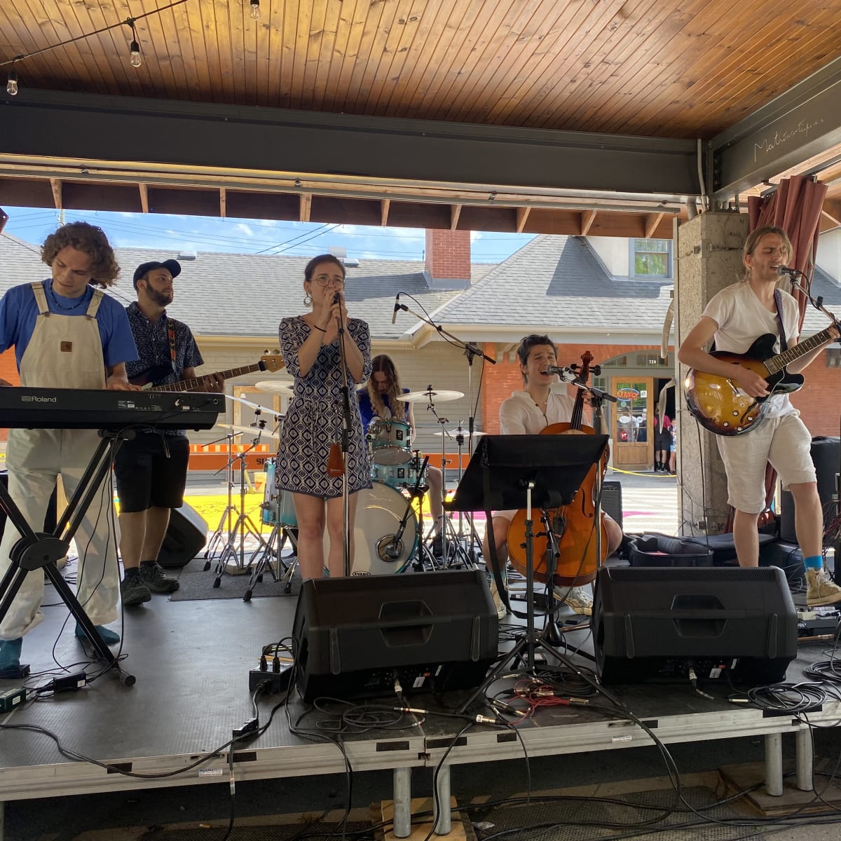 Sherbrooke en musique - Music band performing on an outdoor stage.