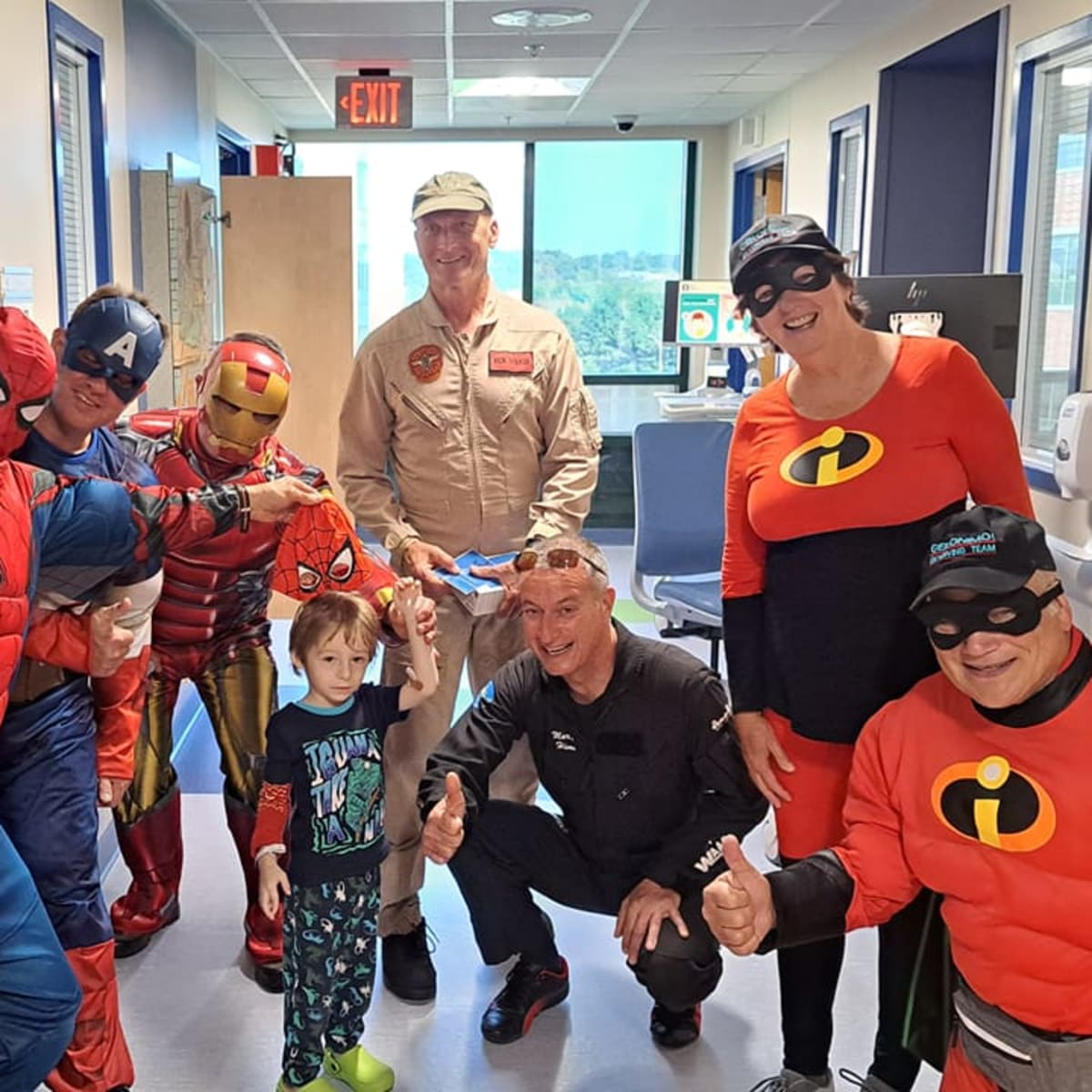 AERO Gatineau-Ottawa Airshow - A child accompanied by adults in superhero costume
