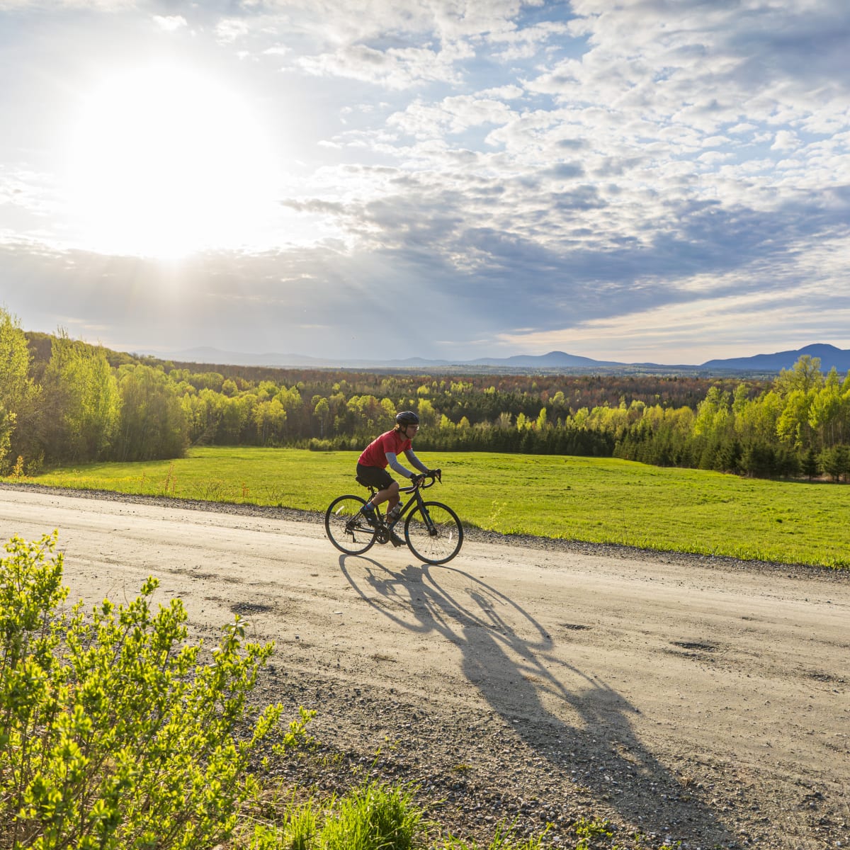 Cyclist on a country road in Magog.