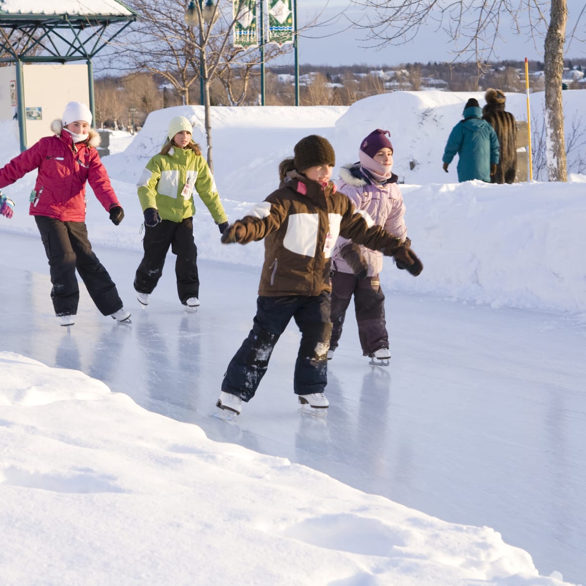 Kids on a skating rink.