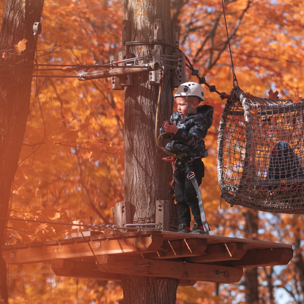 Kid at Arbraska Chauveau in fall.