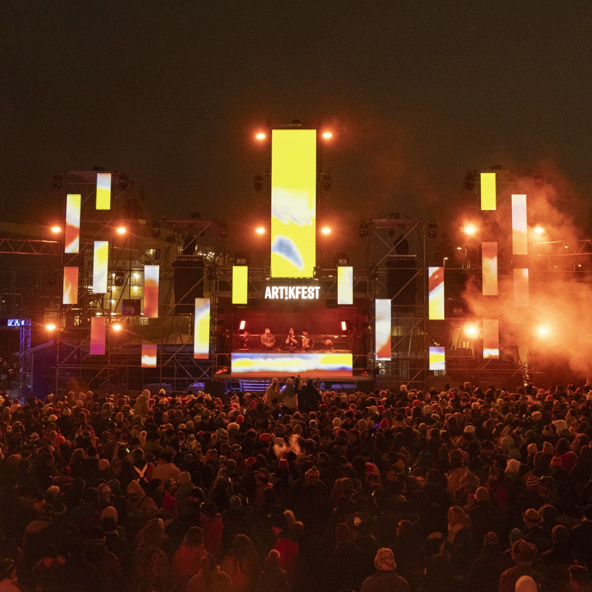 Electro show illuminated in orange at ArtikFest.