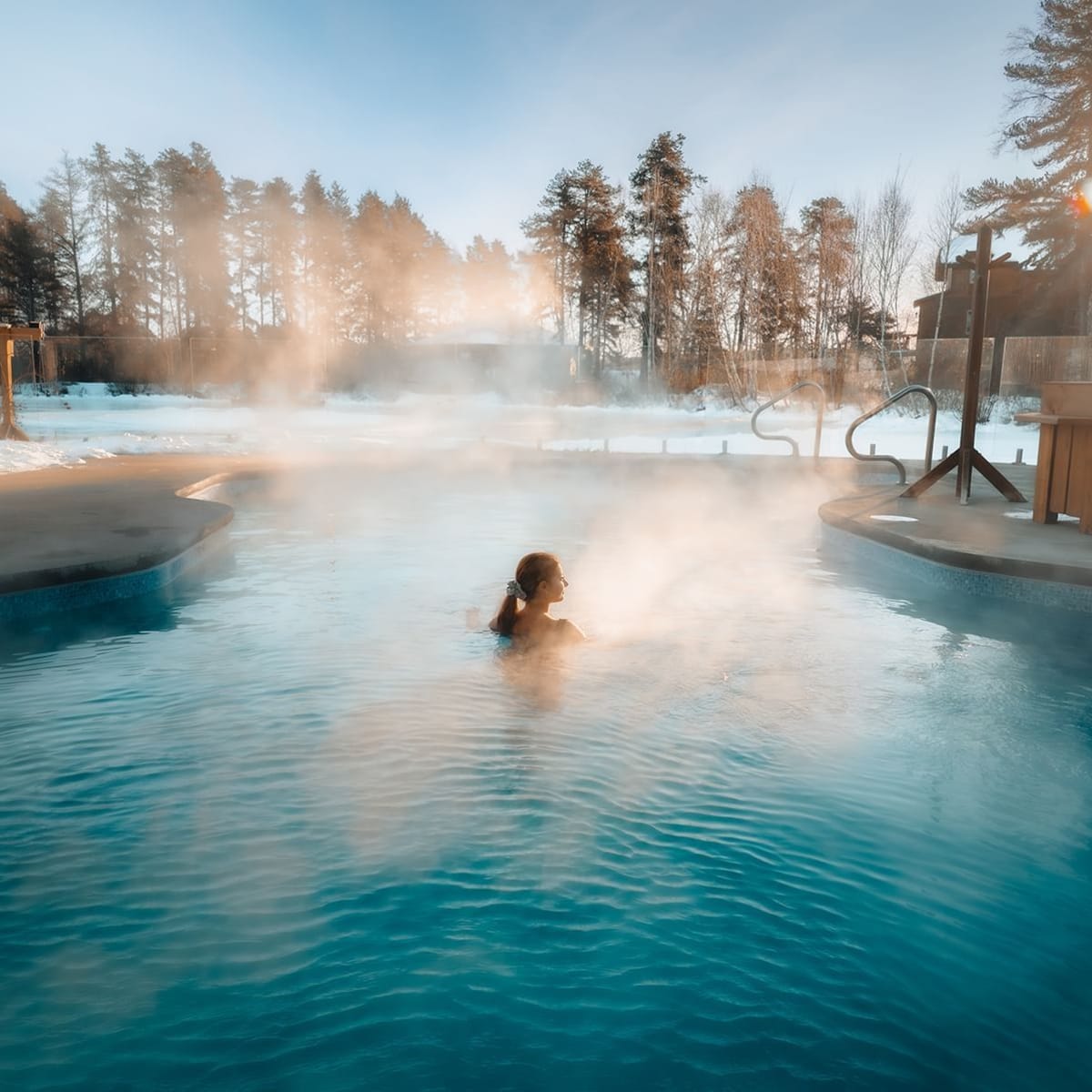 Outdoor heated pool in winter at Auberge du Lac Taureau.
