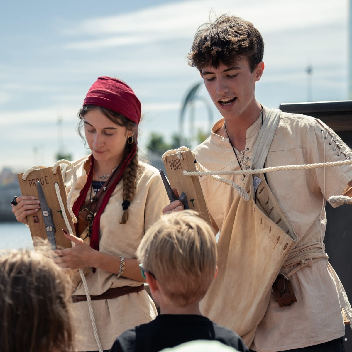 Pirate entertainers present a new riddle to children aboard the Bateau Fantôme in Montreal's Old Port