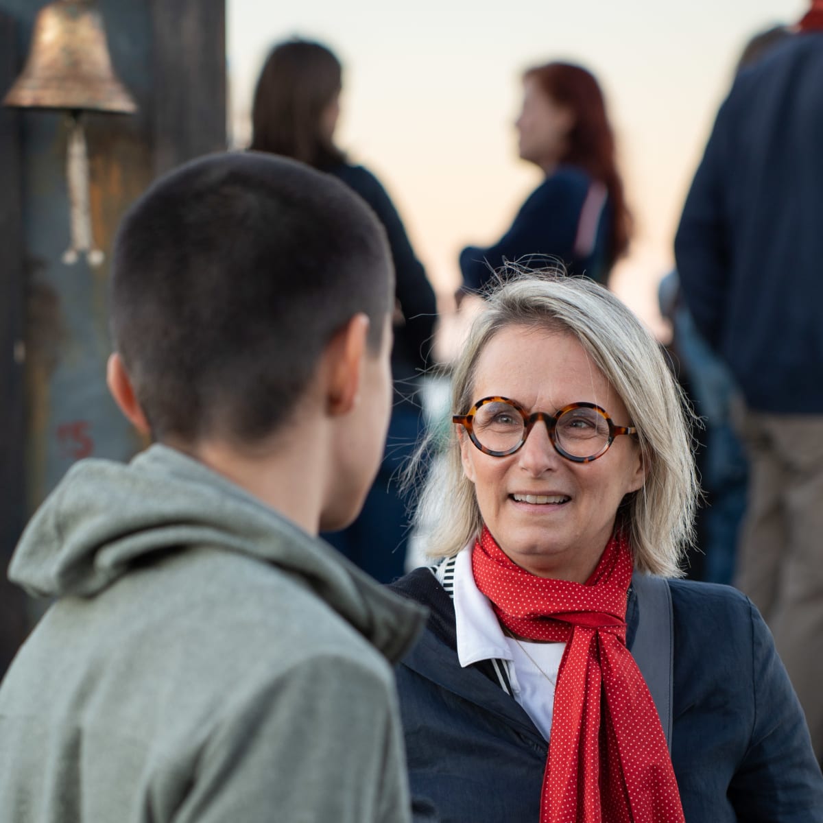 A teenager and his mother aboard the Bateau Fantôme in Montreal's Old Port