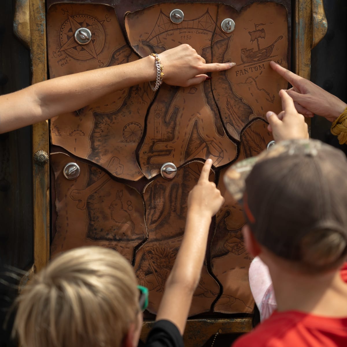 On board the Bateau Fantôme in Montreal's Old Port, children read the pirates' map.
