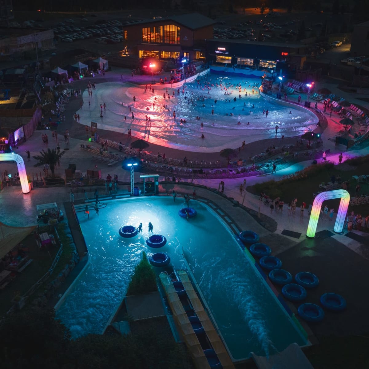 Wave pool lit up in the evening.
