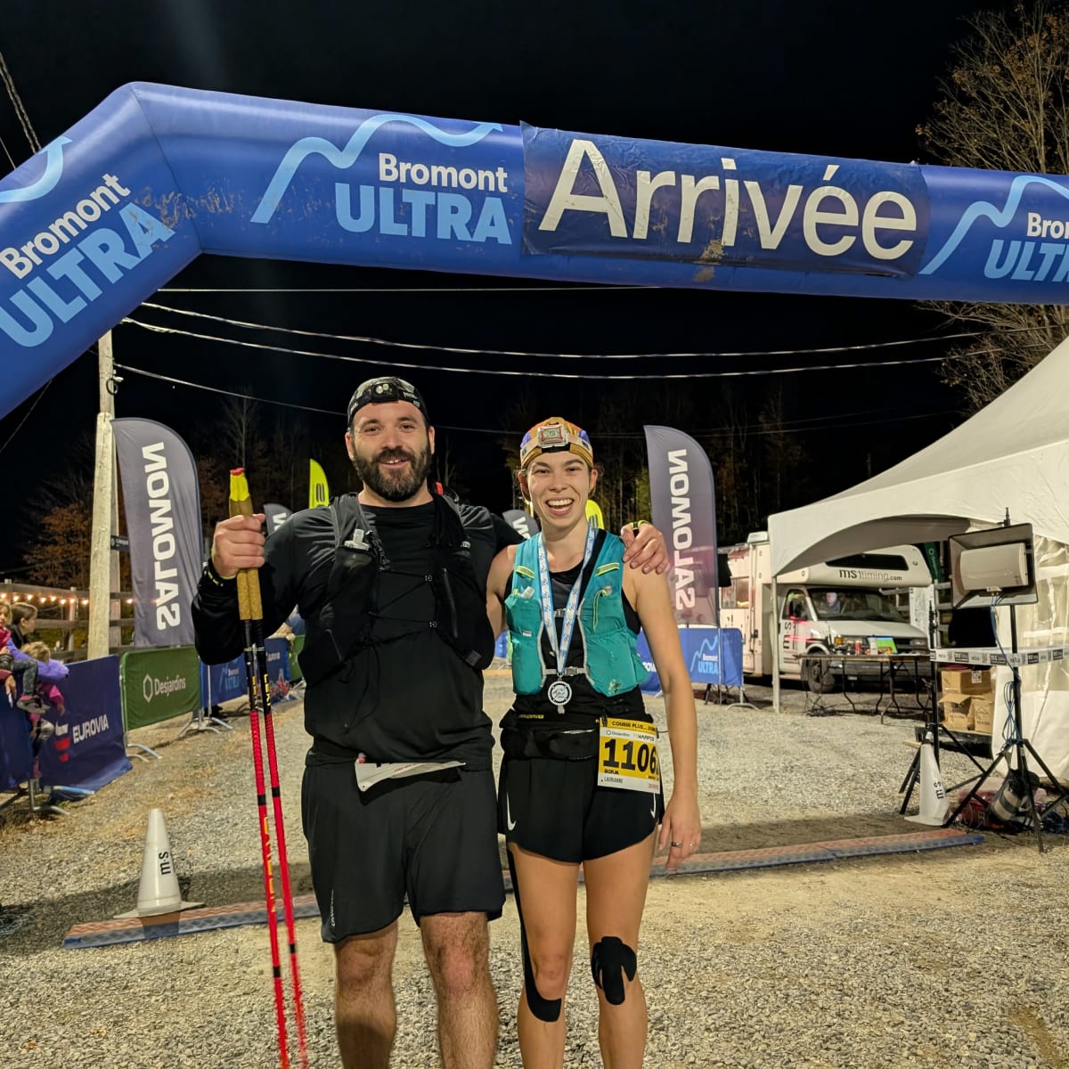 Two people at the finish line at Bromont Ultra.