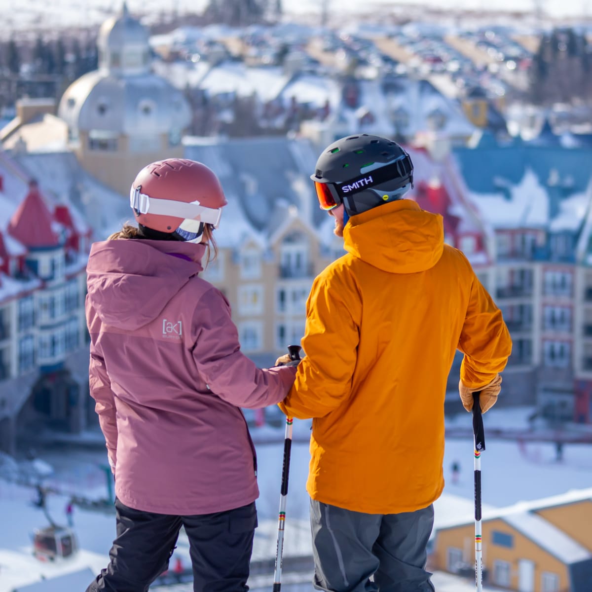 Two skiers at the summit of Mont-Tremblant.