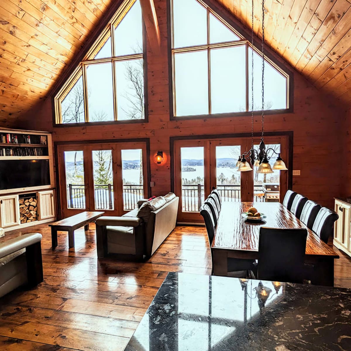 Living room and kitchen of a chalet.