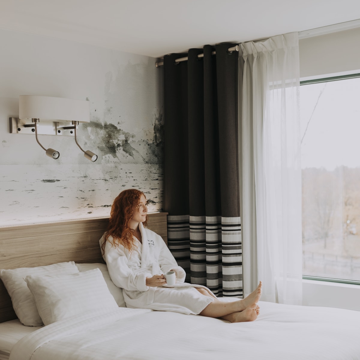 A woman lying in bed.