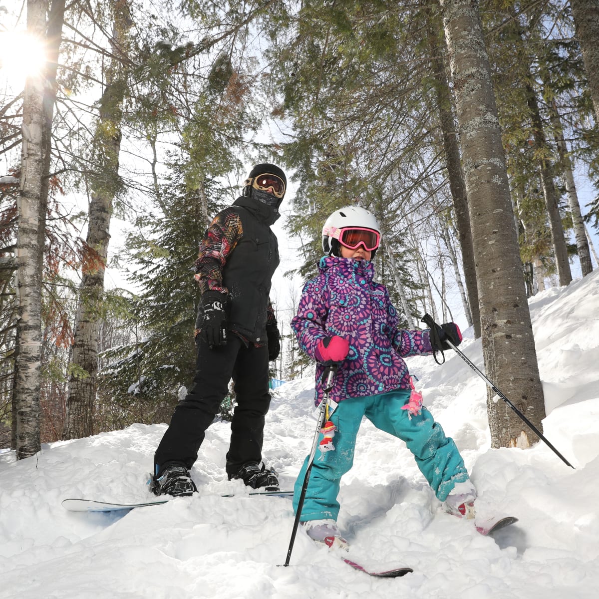 Children skiing and snowboarding at Tobo Ski.