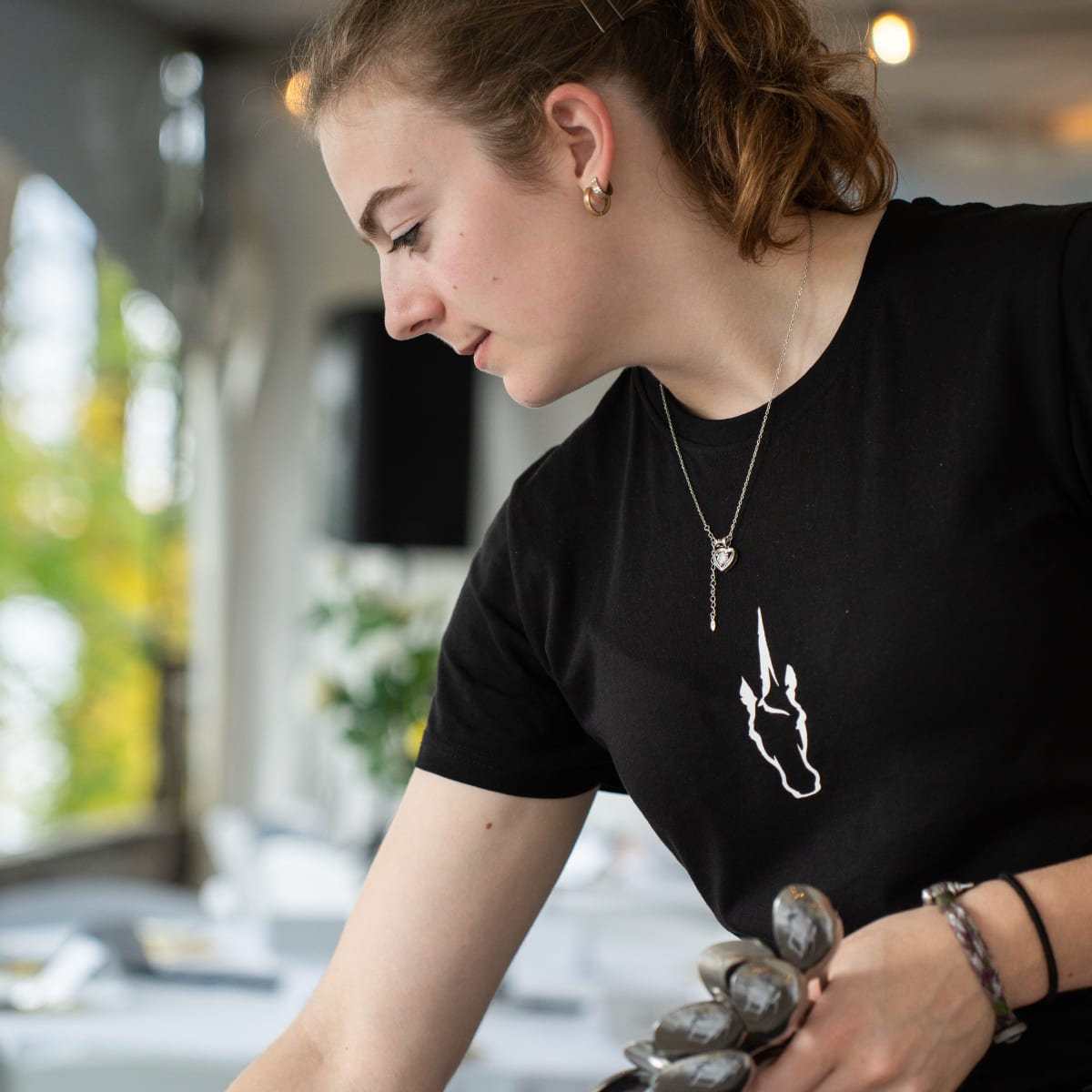 A waitress in a cruise ship.