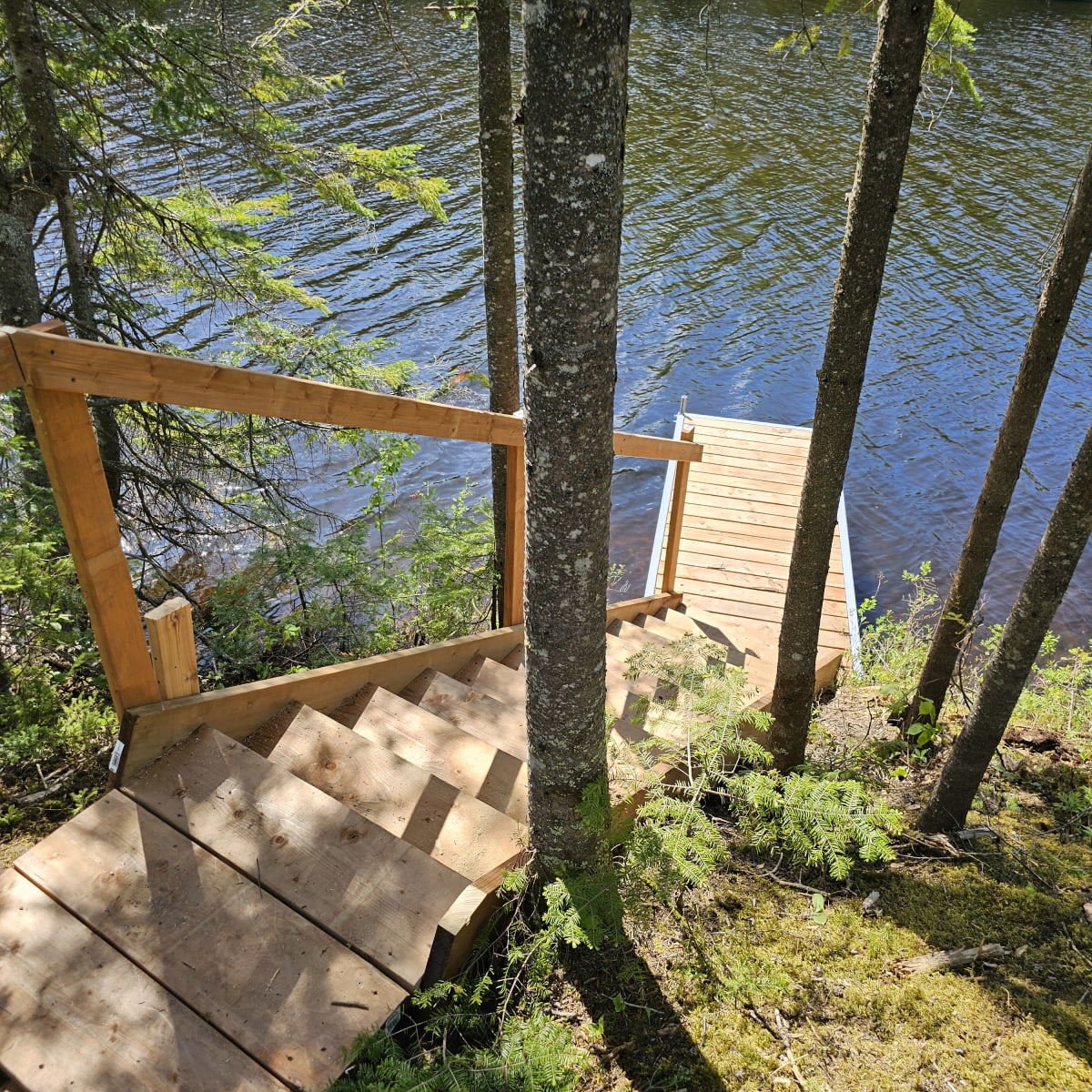 Stairs leading to a lake.