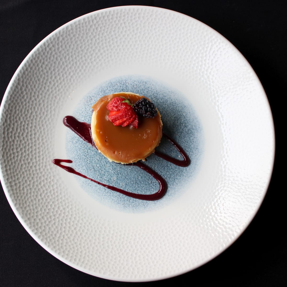 Caramel and berry dessert.