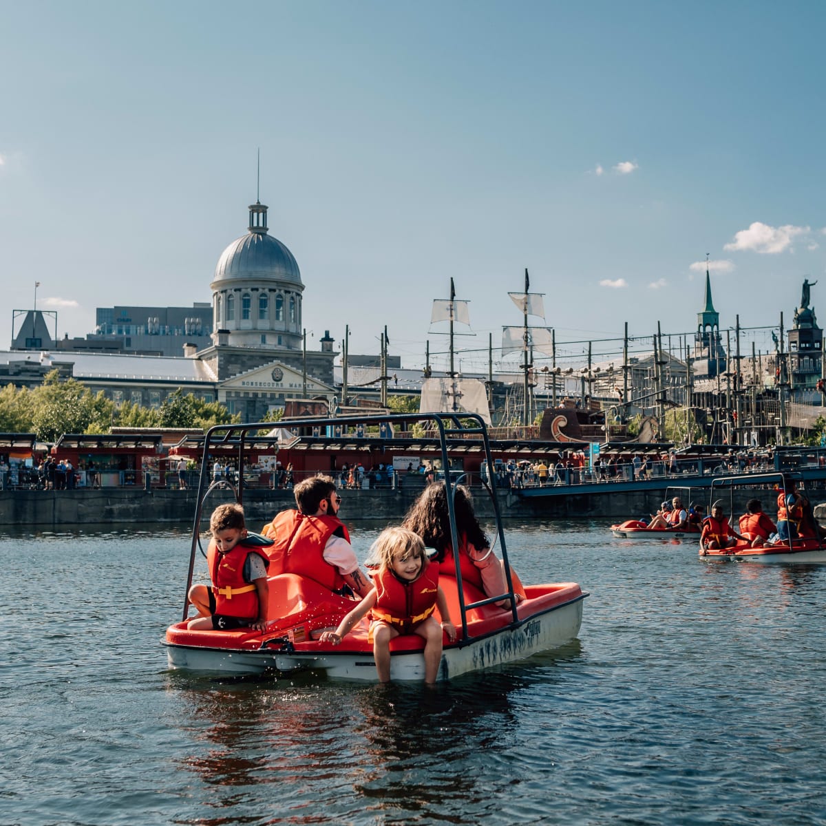 A family on a pedal boat.