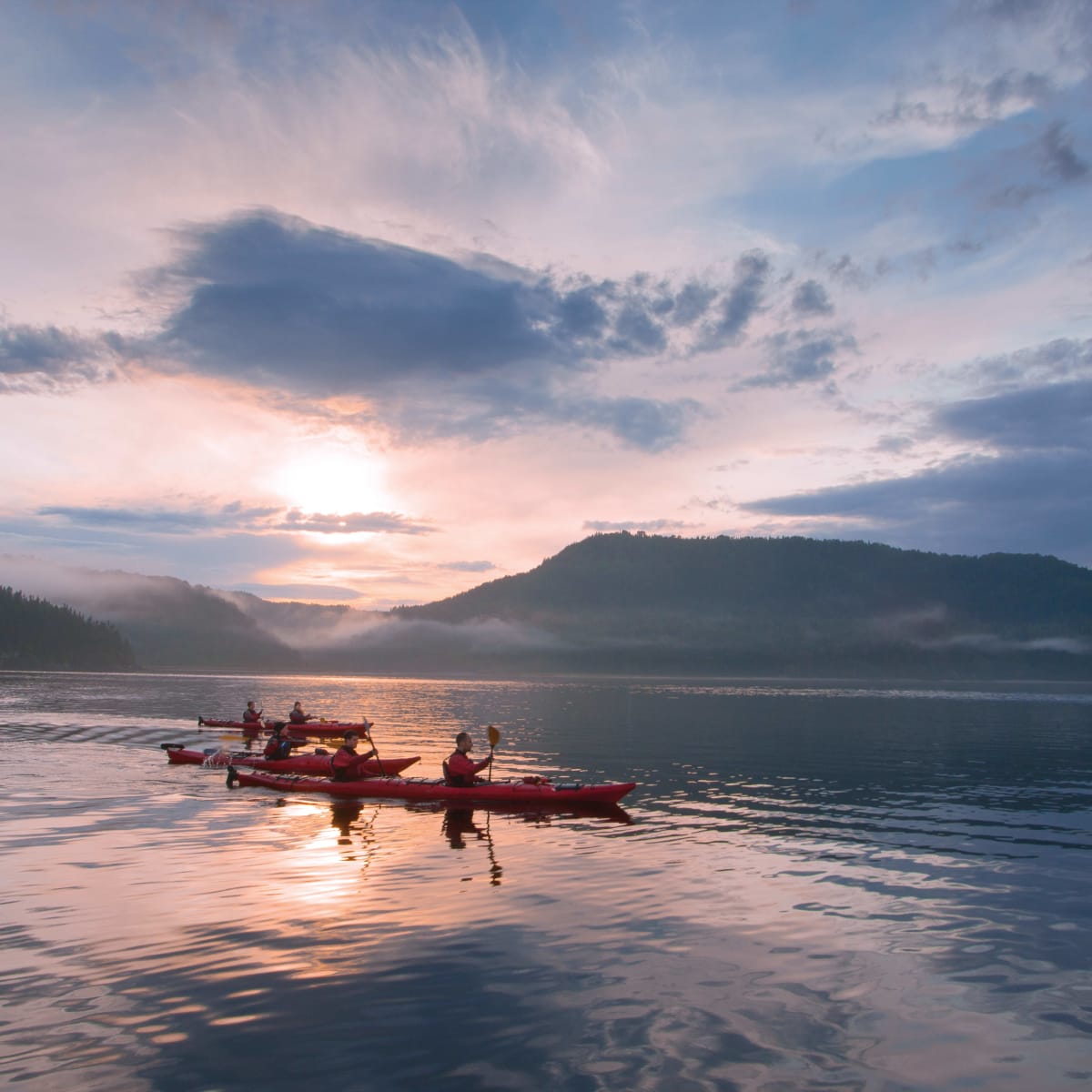 Kayakers at sunset in Parc national du Bic.