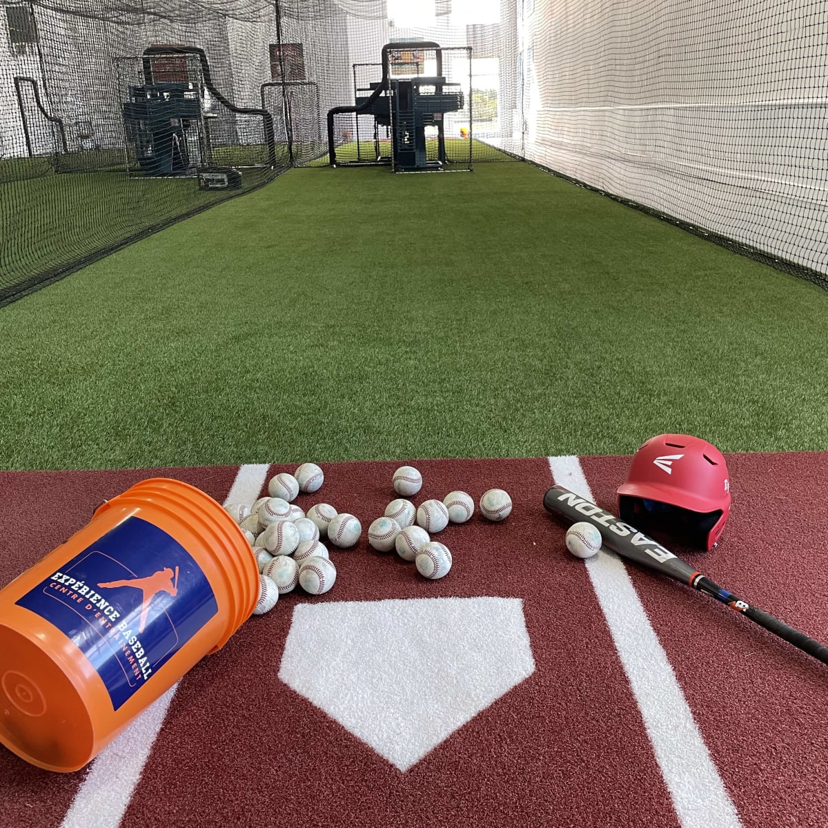 Indoor baseball practice field.