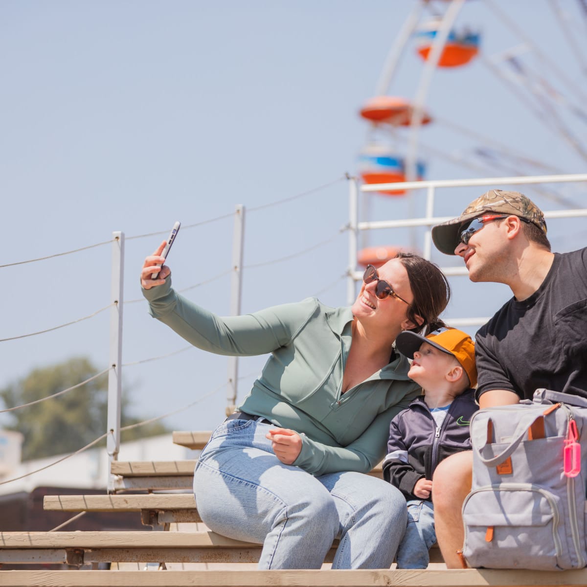 A family taking a selfie.