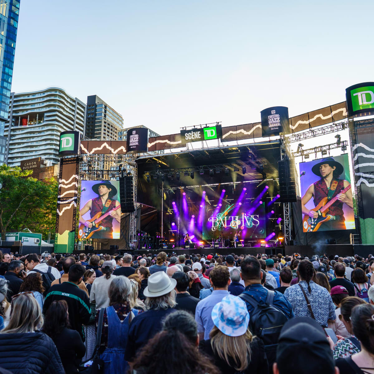 Crowd in front of a giant screen
