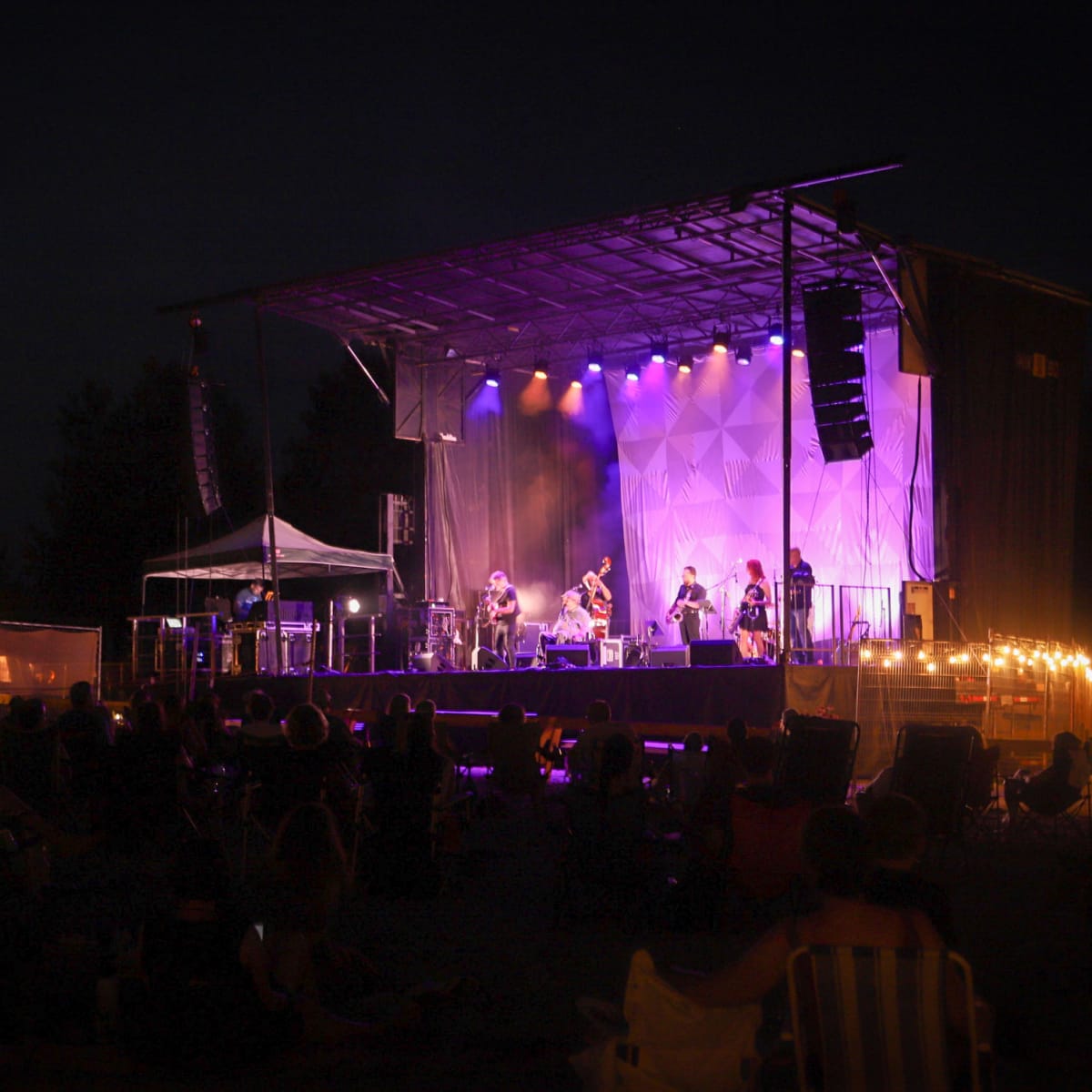 SuperFolk Morin-Heights Festival - A stage lit up at night.