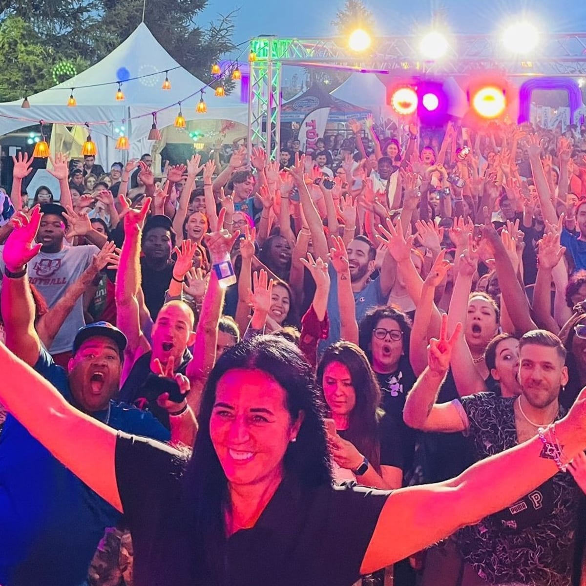 Soraya in front of a crowd at Taste of the Caribbean Festival.
