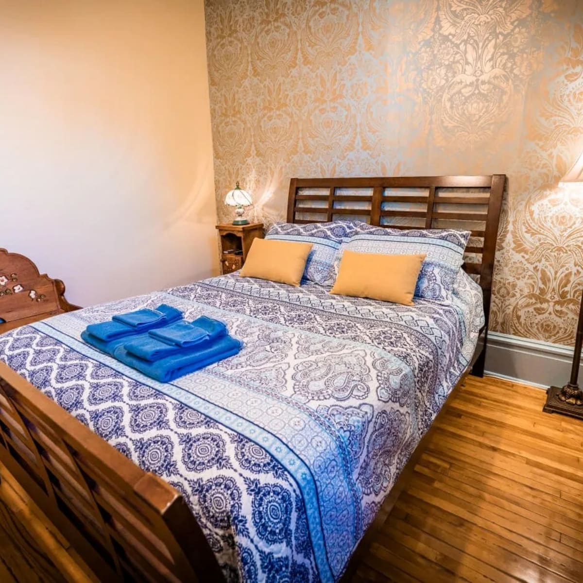 Bedroom at the Aux Plaisirs Partagés B&B.