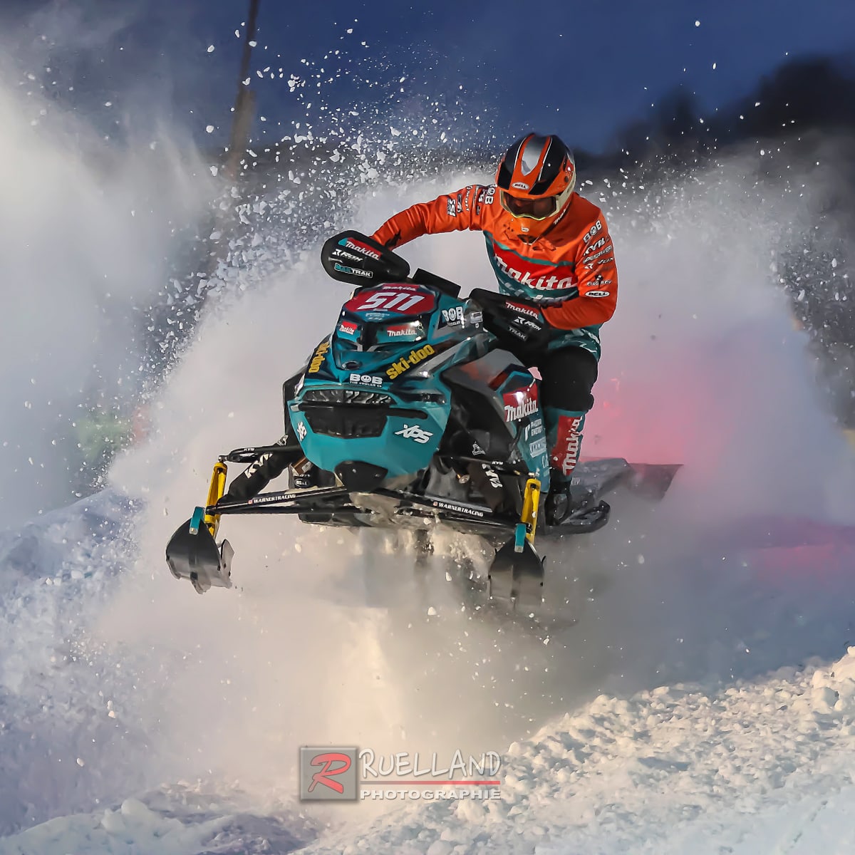 Snowmobile jumping at Grand Prix Ski-Doo de Valcourt.