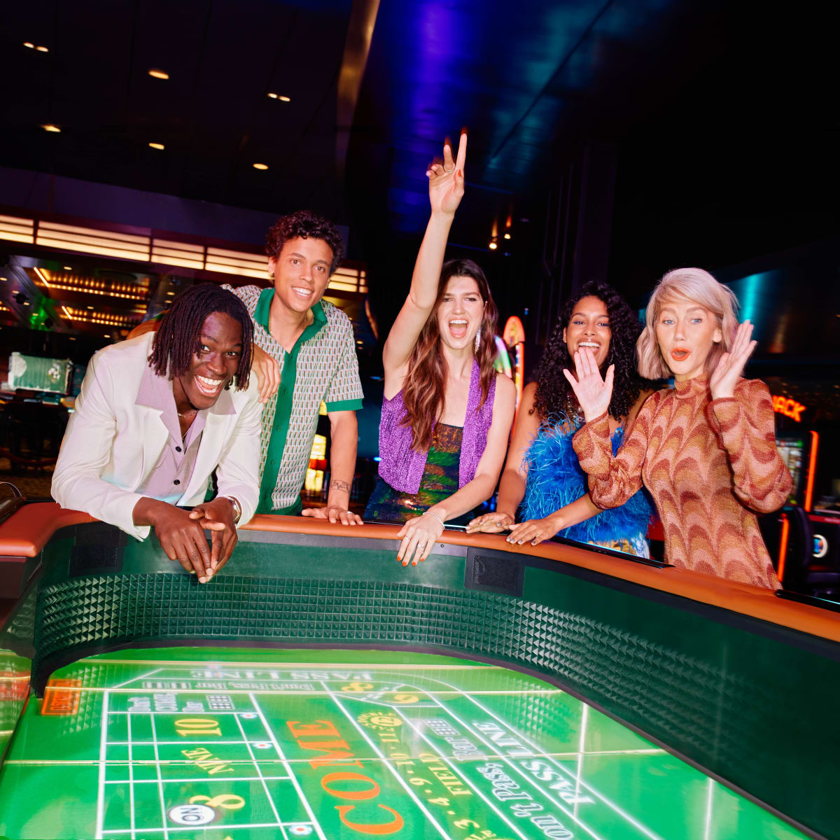 A group of friends having fun at the casino.