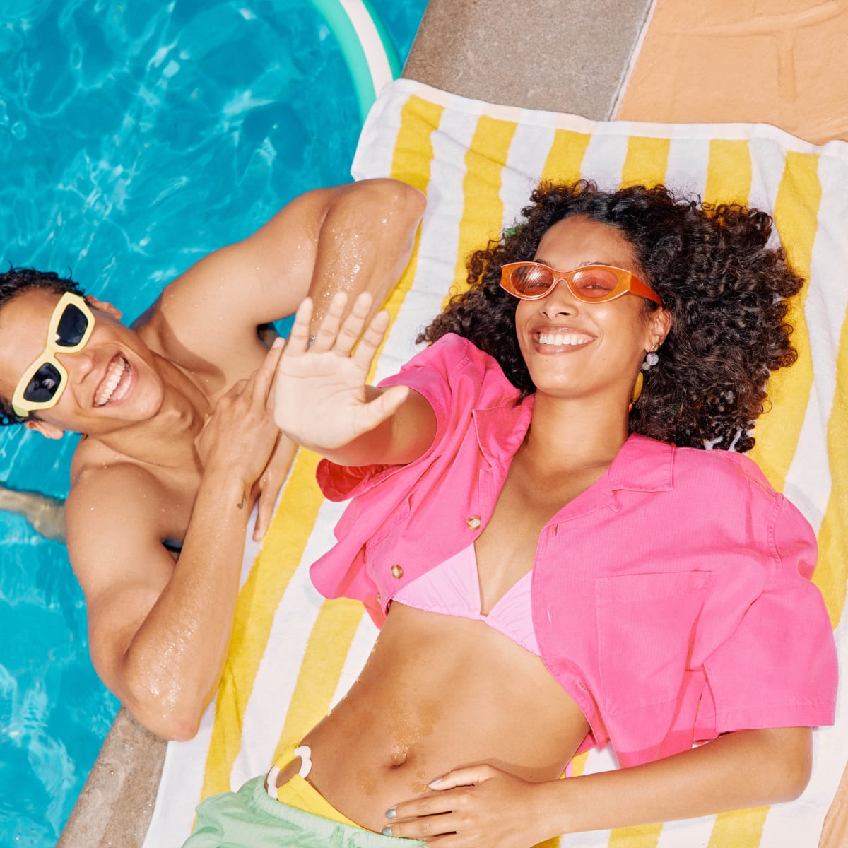 A couple by the pool.