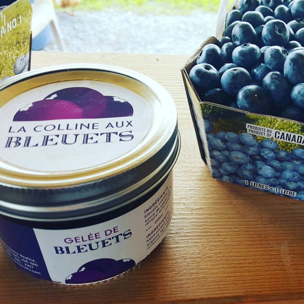 Blueberry jelly and fresh blueberries.