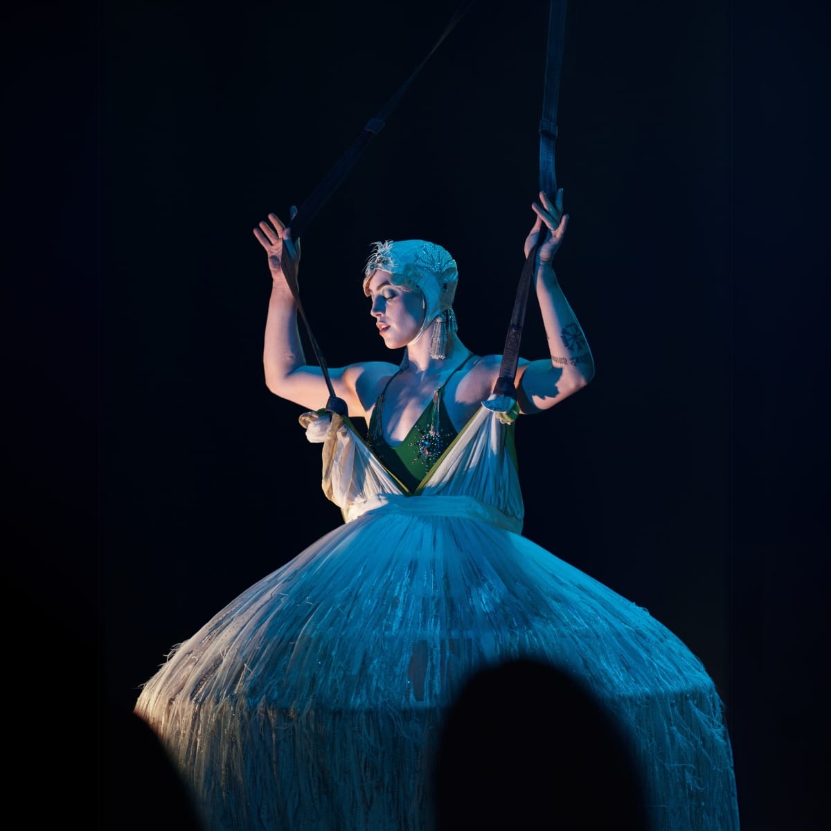 Le Monastère - Cabaret de Cirque - An artist is inside a suspended dress