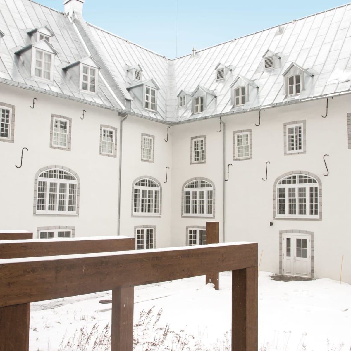 Exterior of the Monastère des Augustines in winter.