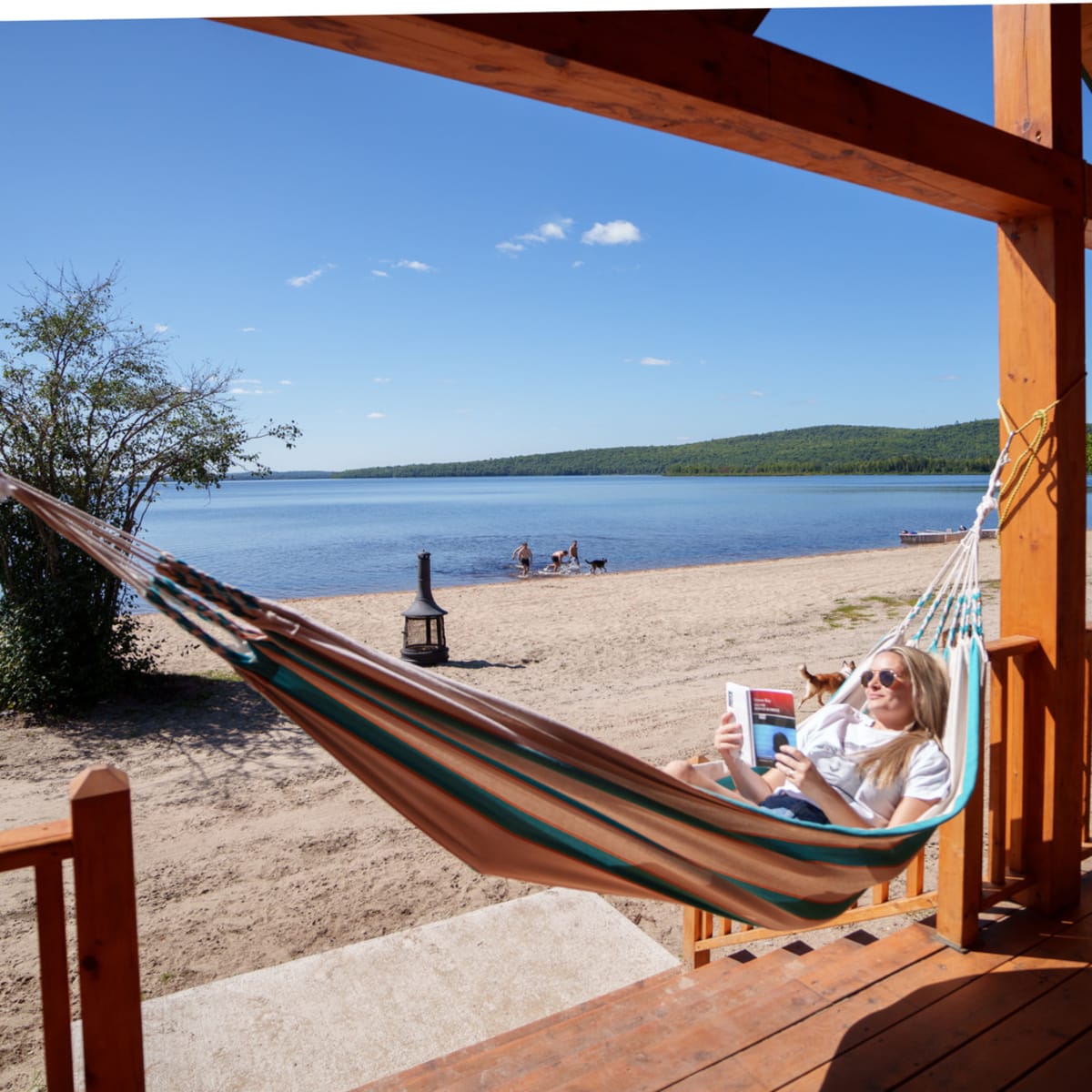 Woman in a hammock in an outfitter in the Laurentians.