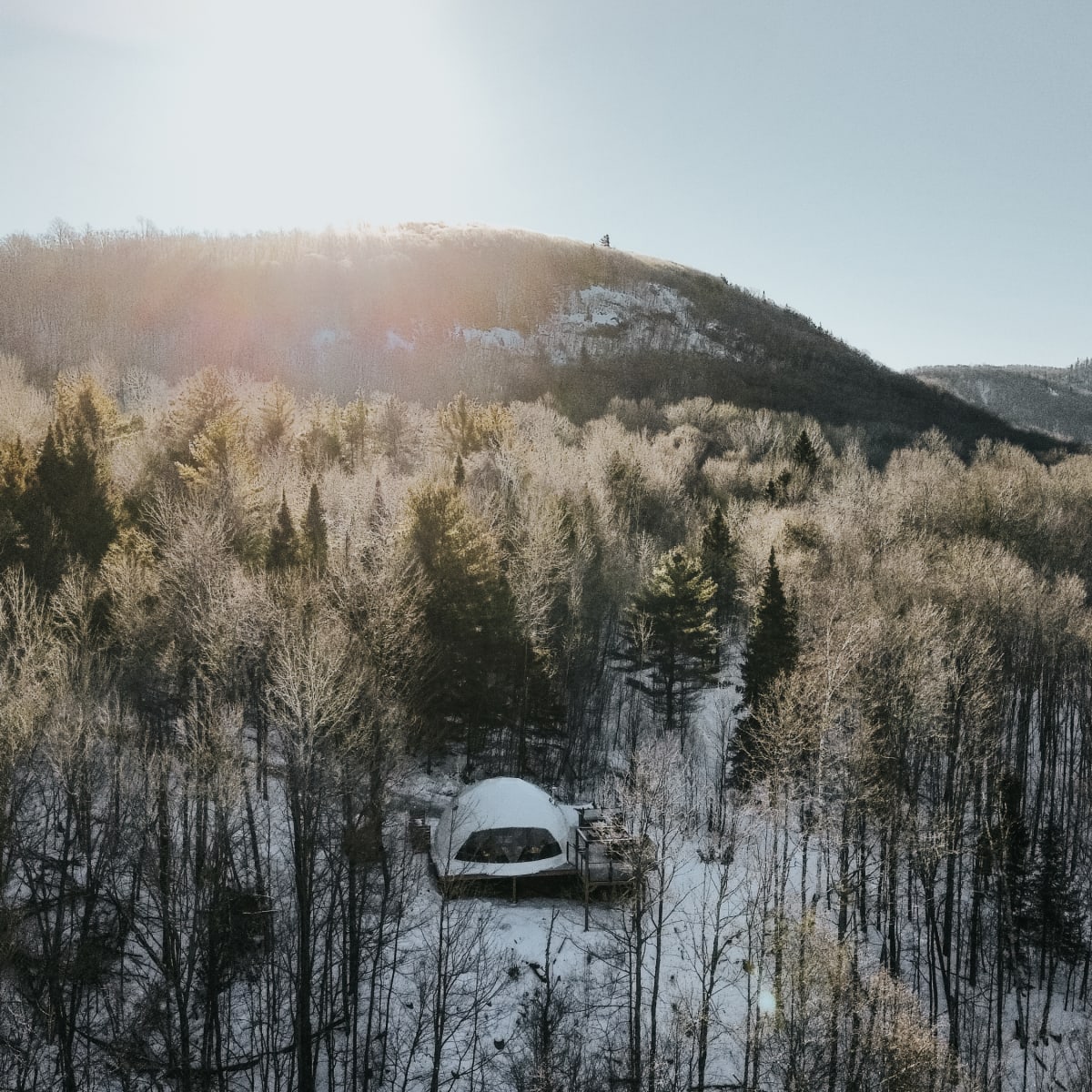 Discover Outaouais and its many areas with these must-sees! - Aerial view of Dômes Outaouais in winter