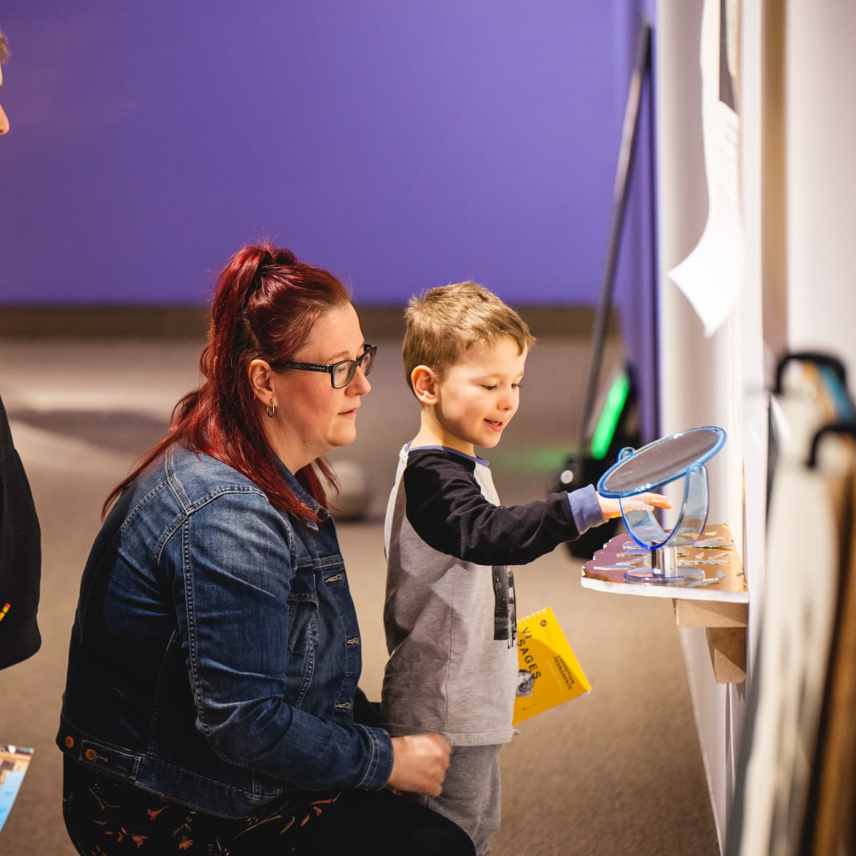 Family visiting a contemporary art exhibition at the Musée du Bas-Saint-Laurent. 