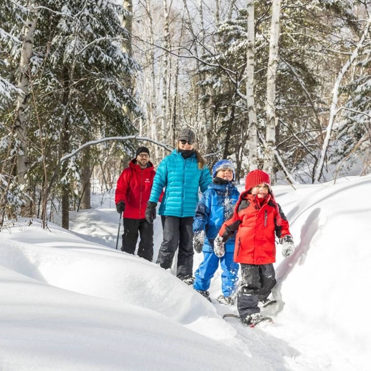 Family snowshoeing in winter.