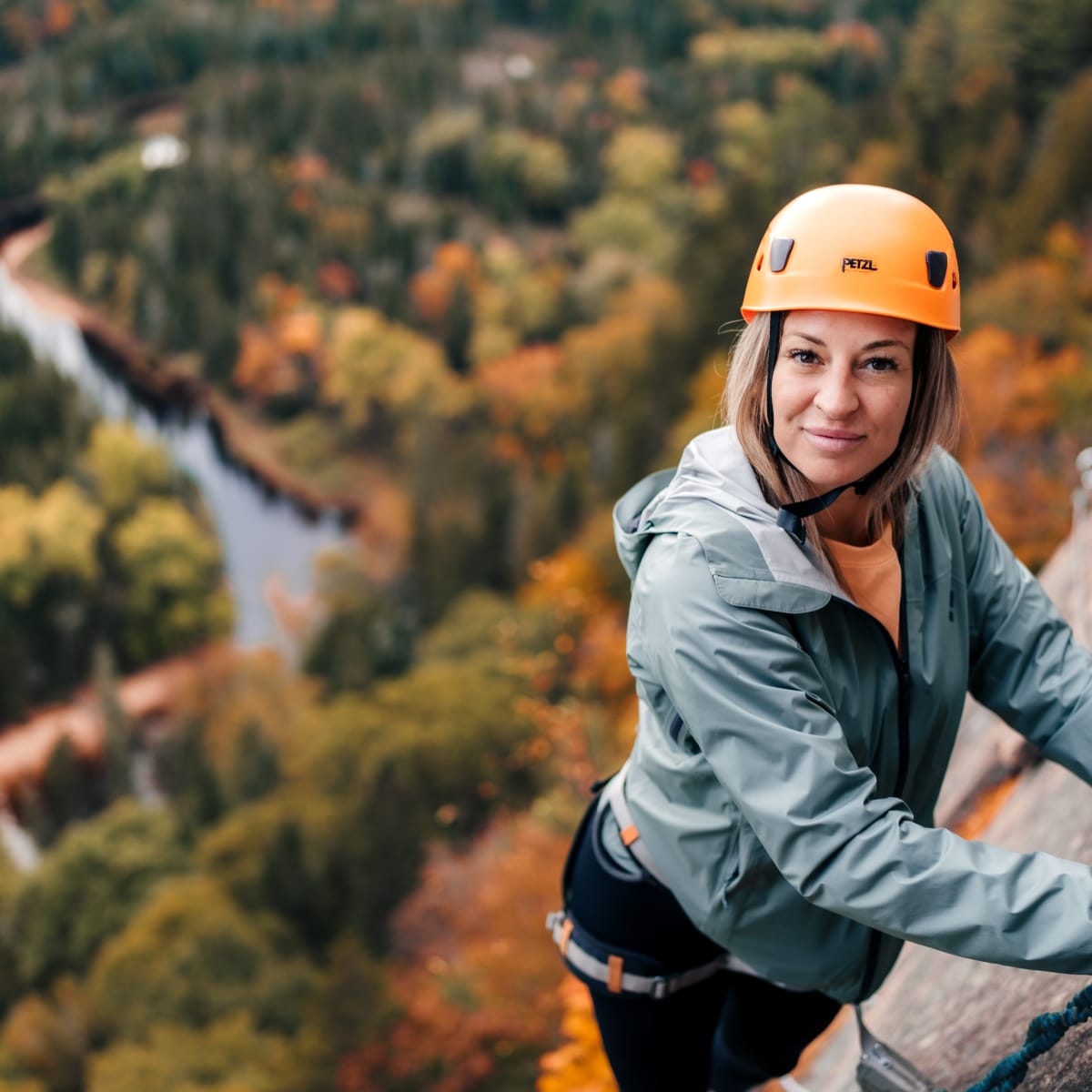 Woman on the via ferrata trail at parc national du Mont-Tremblant.