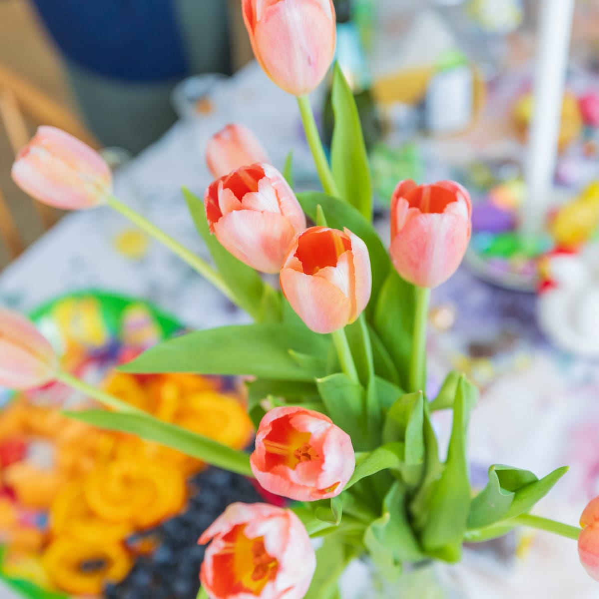 Tulips and fruits of a flowery table.