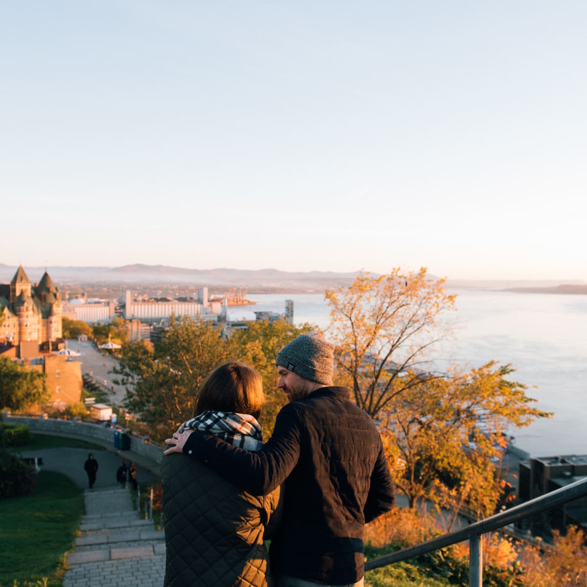 Couple in Québec City in the fall by the river.