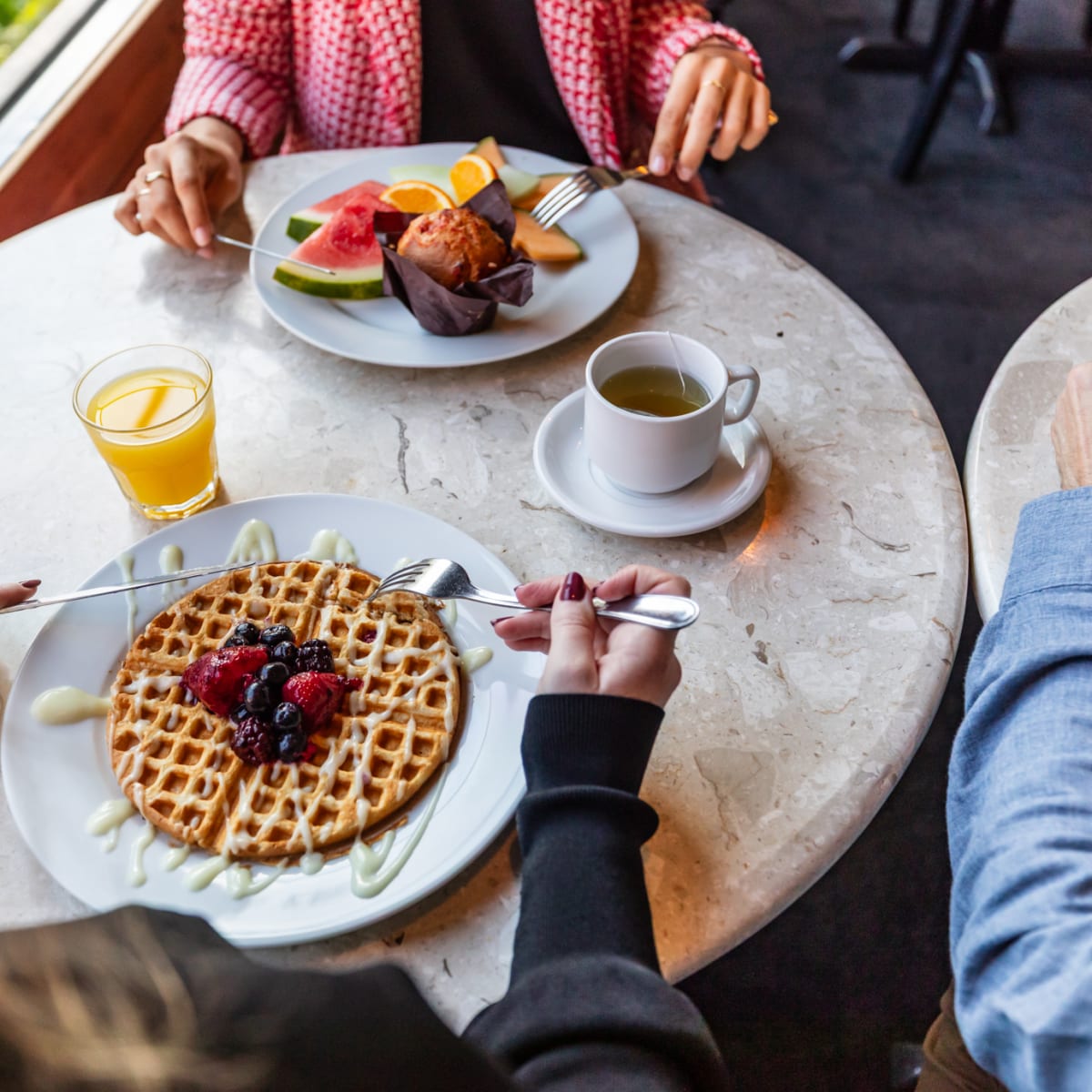 Women having breakfast at a hotel.