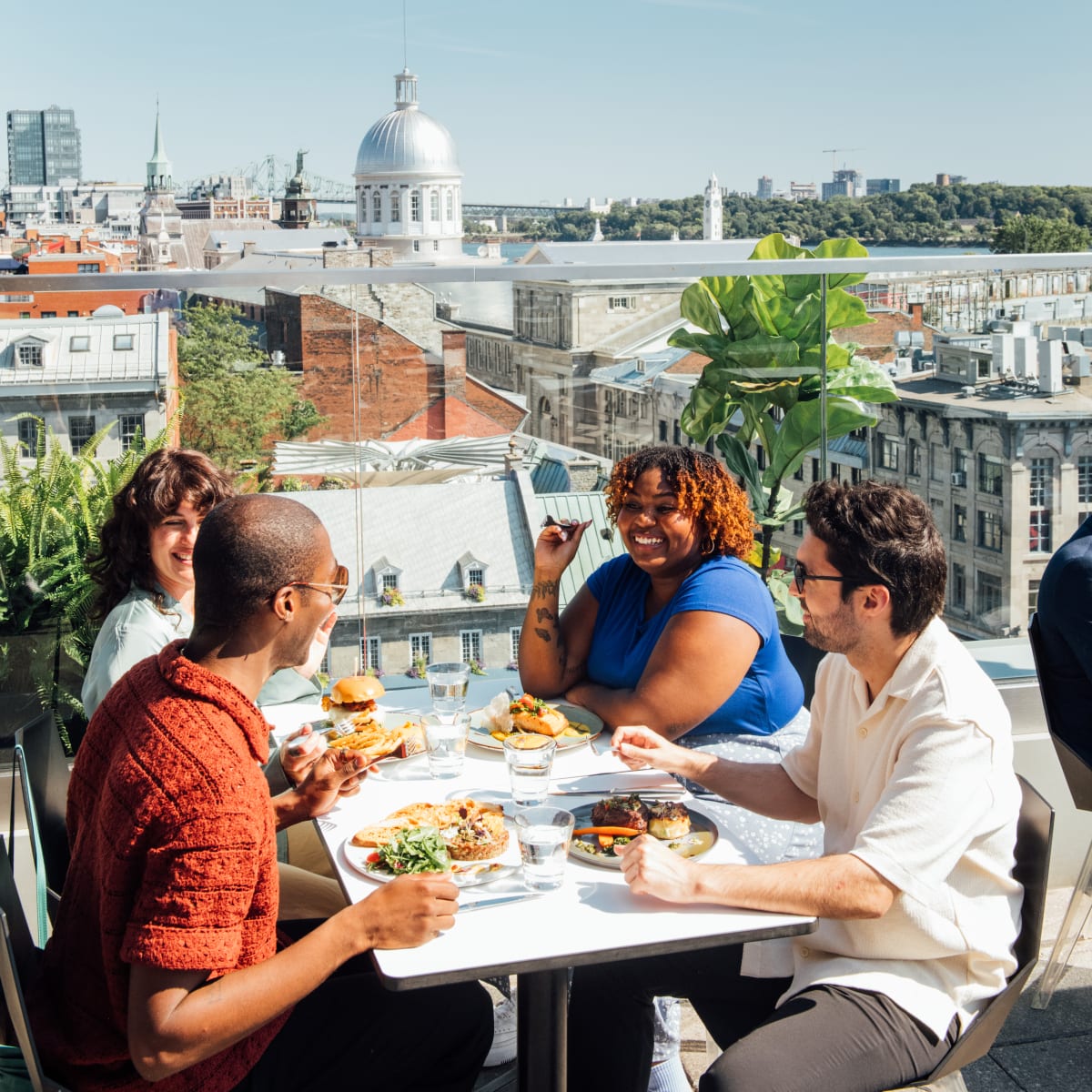 Group of friends on a rooftop terrace.
